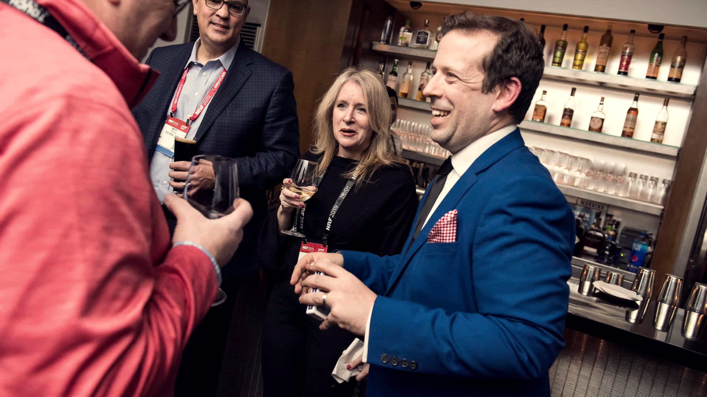 Eric Lerner mid-performance, engaging guests at a corporate event